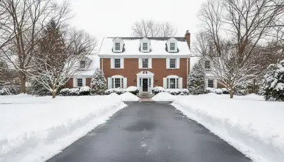 Cleared driveway after professional snow removal by Chop Chop Landscaping in Highland Park, IL