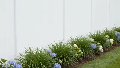 White wooden privacy fence installation by Chop Chop Landscaping in Highland Park, IL